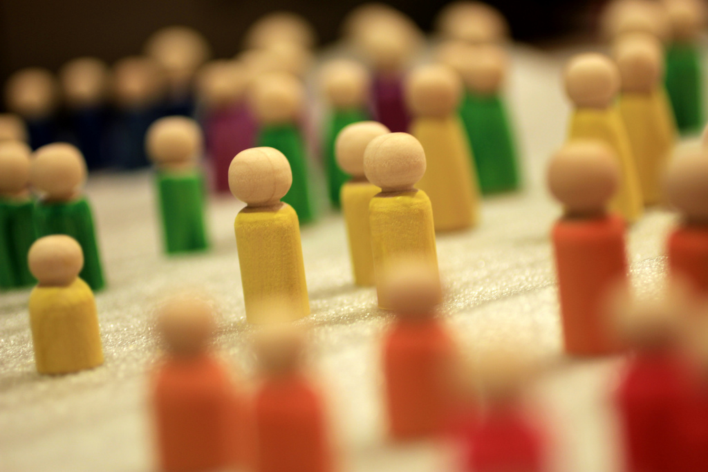 abstract image of wooden people representing community